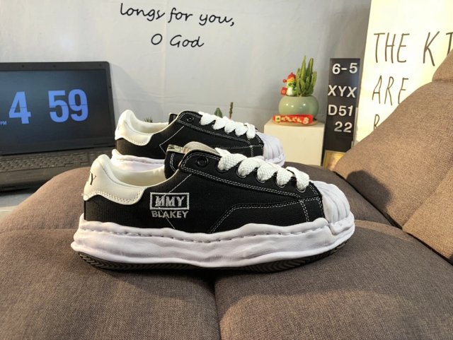 Maison Mihara Yasuhiro Maison Mihara Yasuhiro Black White Twisted Sole Sneakers - Buy on Kakobuysheetfind