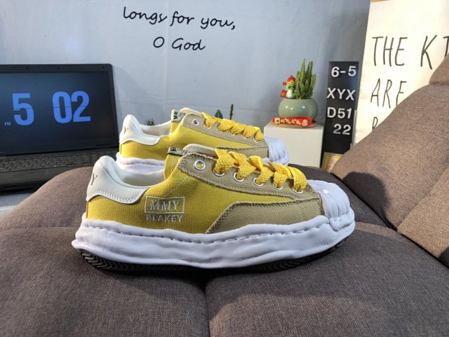 Maison Mihara Yasuhiro Maison Mihara Yasuhiro Blakey Yellow Canvas Sneakers - Buy on Kakobuysheetfind