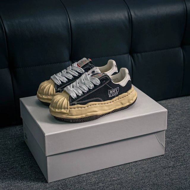 Maison Mihara Yasuhiro Maison Mihara Yasuhiro Black Canvas Sneakers - Buy on Kakobuysheetfind