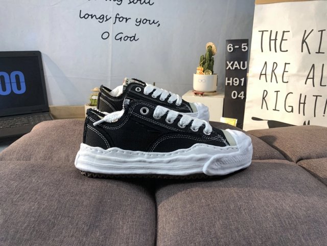 Maison Mihara Yasuhiro Maison Mihara Yasuhiro Black Platform Canvas Sneakers - Buy on Kakobuysheetfind