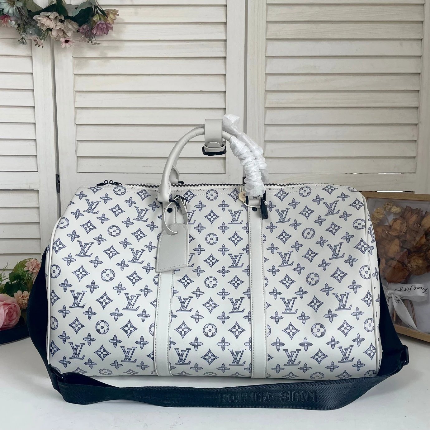 Louis Vuitton Travel Bags Monogram duffel bag with shoulder strap — 32