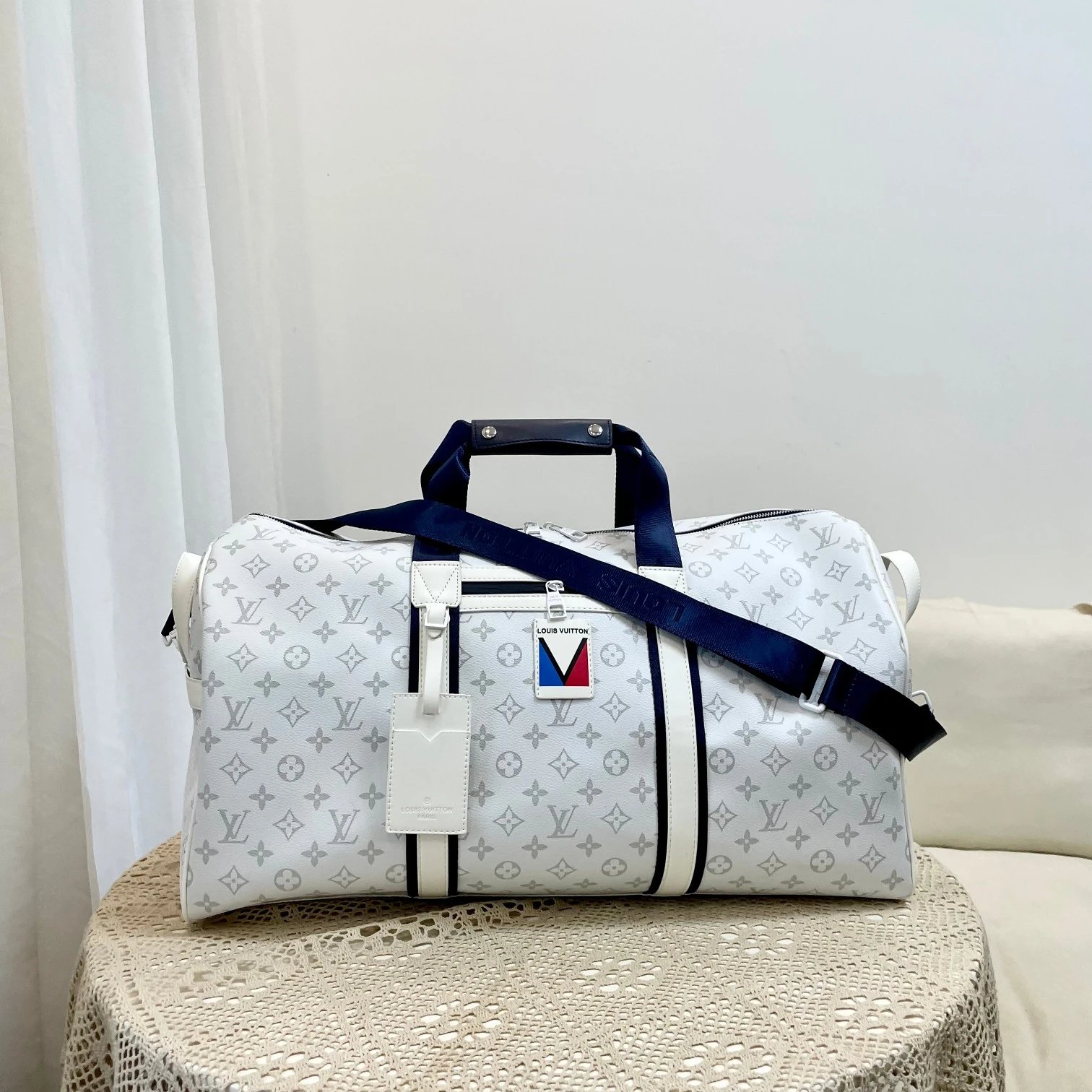 Louis Vuitton Travel Bags Monogram duffel bag with shoulder strap — 35