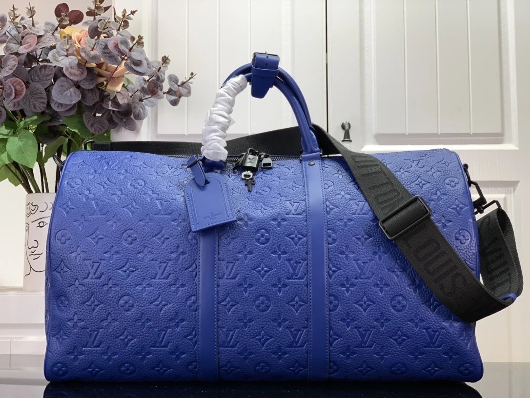 Louis Vuitton Travel Bags Monogram duffel bag with shoulder strap — 28