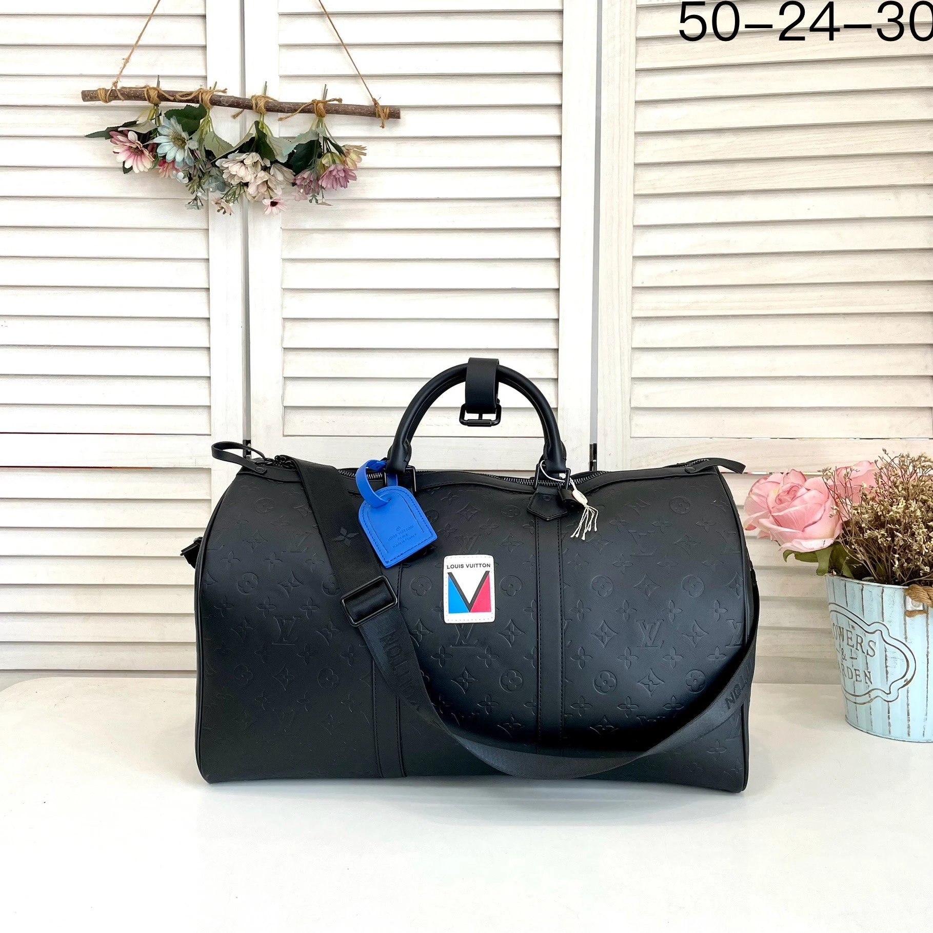 Louis Vuitton Travel Bags Monogram duffel bag with shoulder strap — 34
