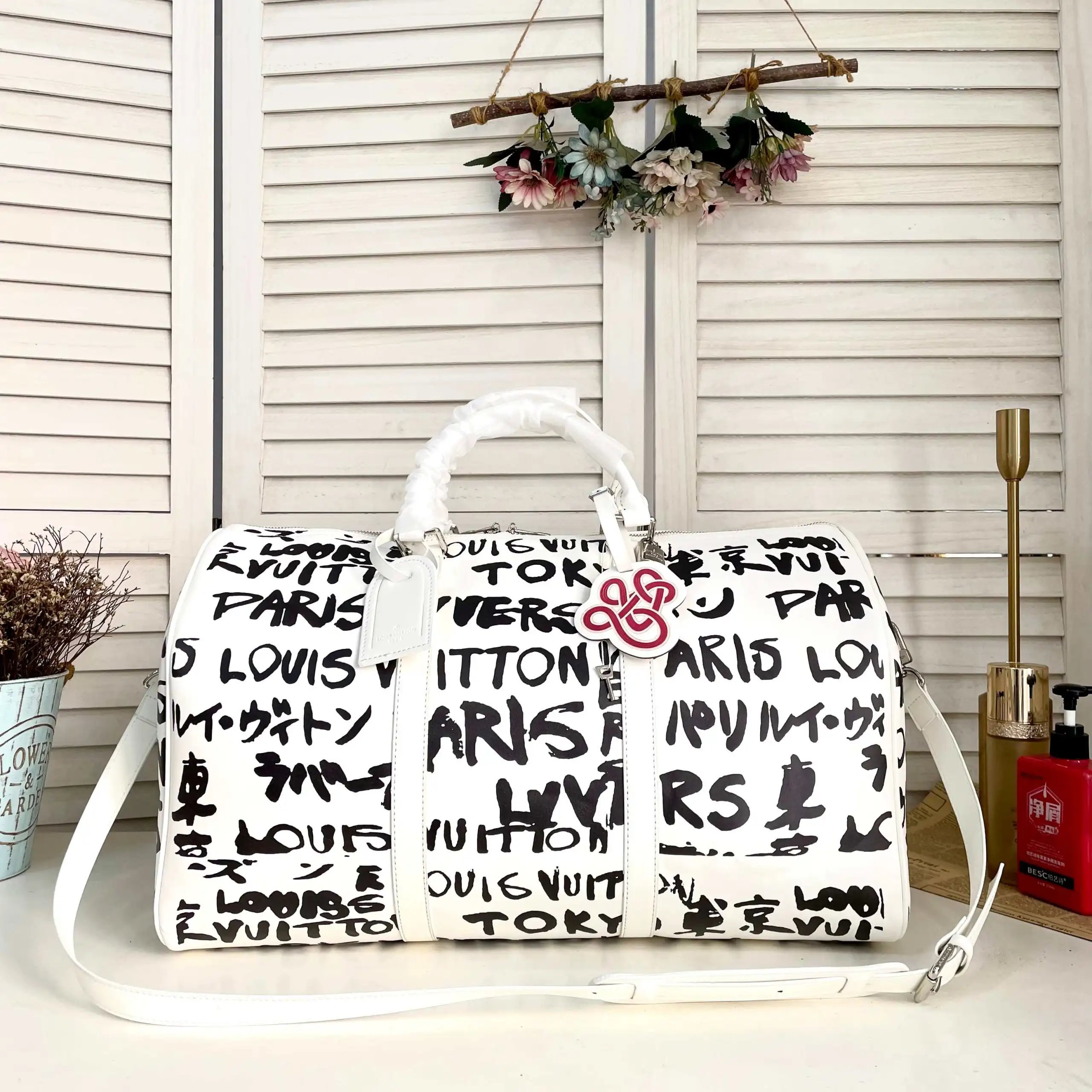 Louis Vuitton Travel Bags Monogram duffel bag with shoulder strap — 36