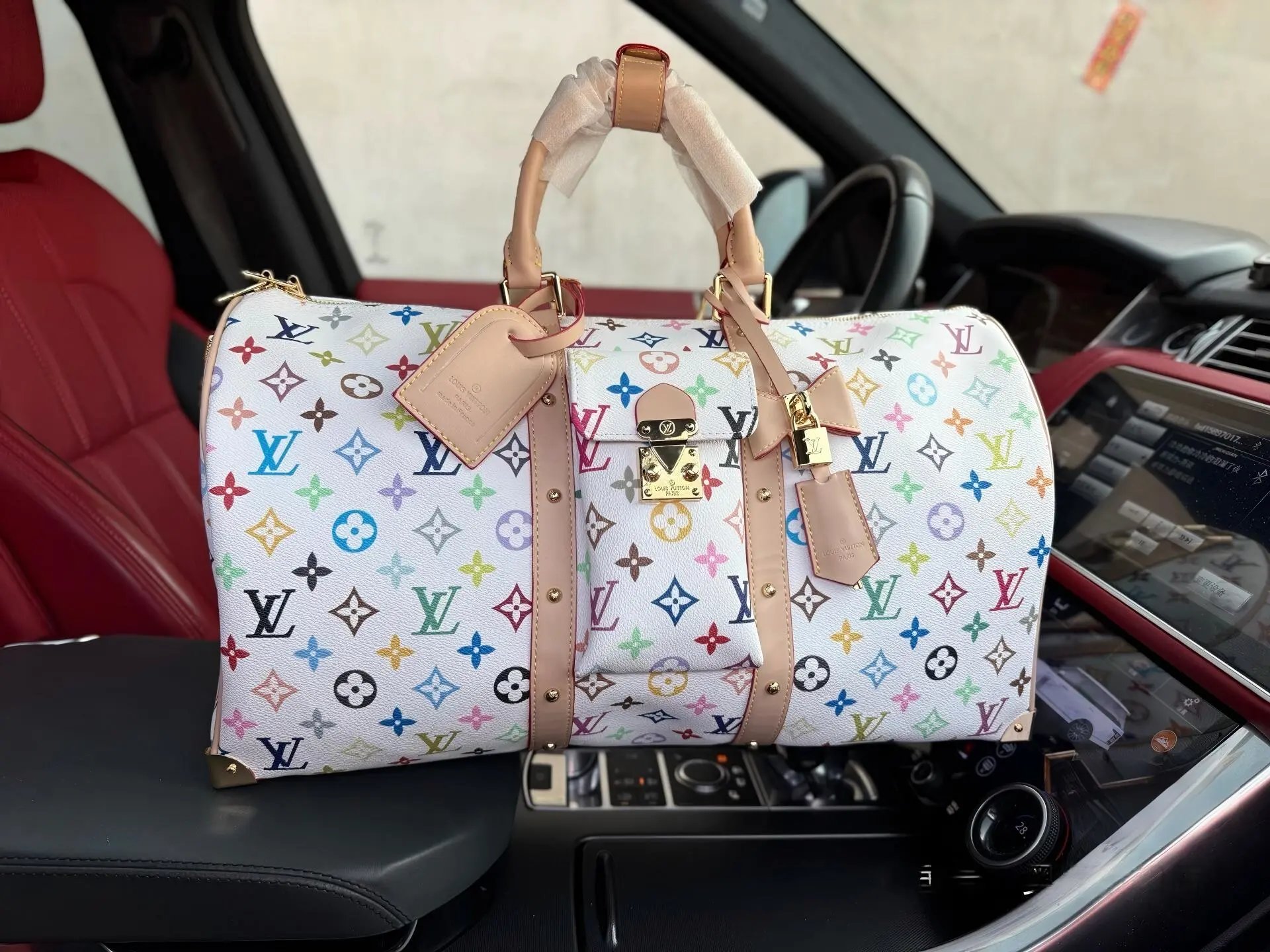 Louis Vuitton Travel Bags Monogram duffel bag with shoulder strap — 26