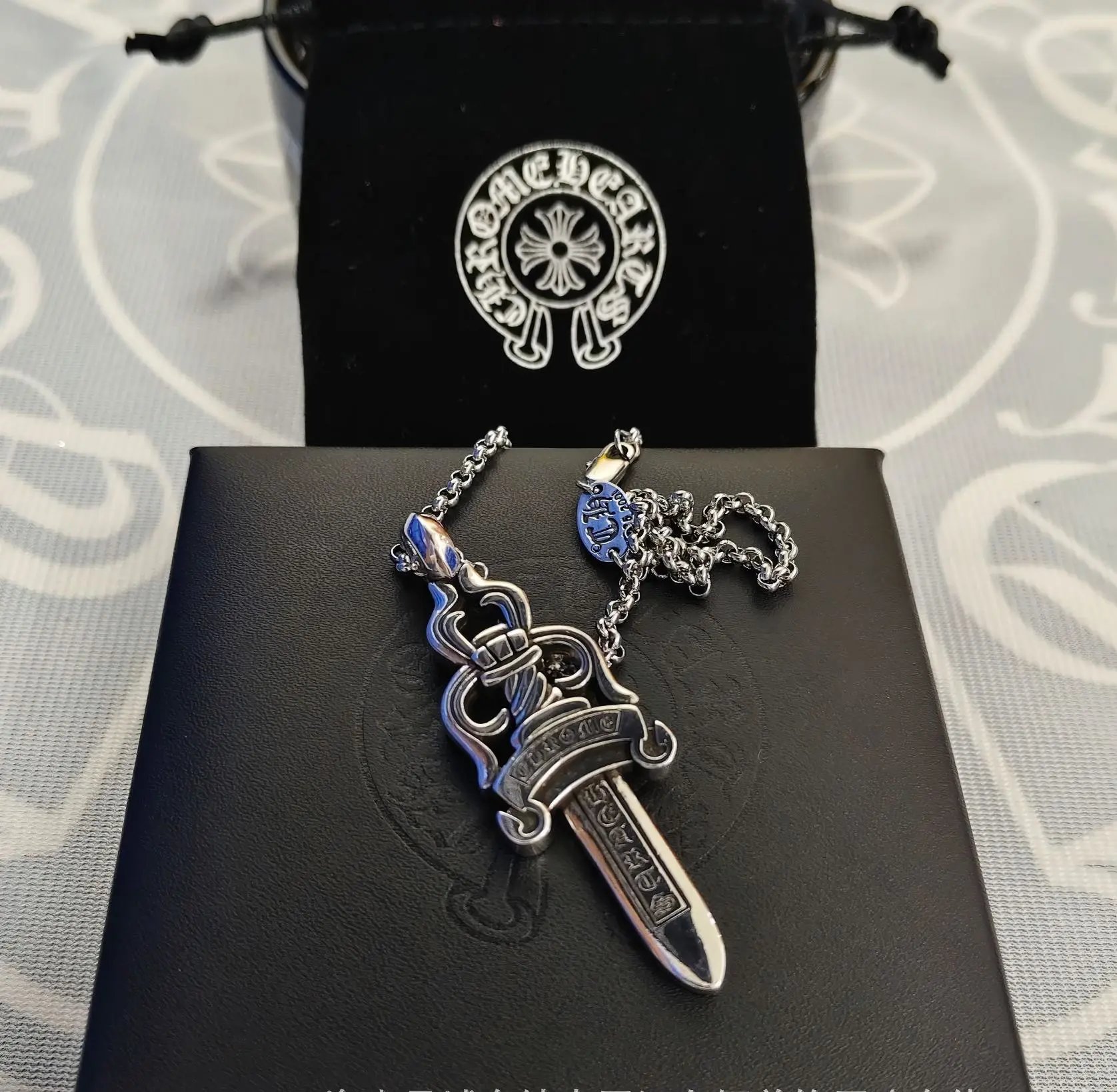 Large Sword with Pearl Chain