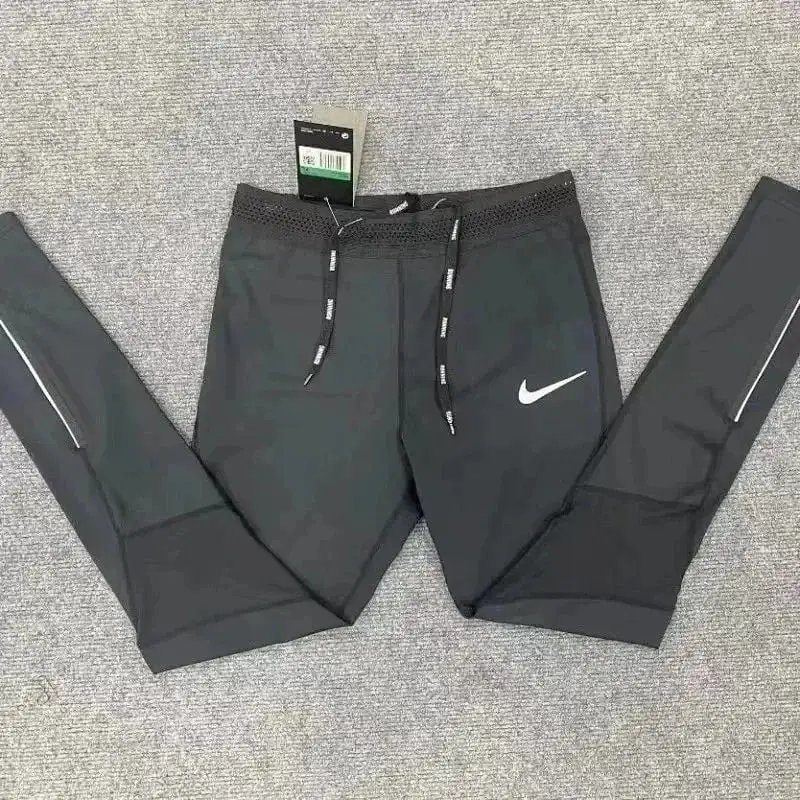 Nike Tracksuits Hooded zip-up tracksuit — Black track pants with a white hook, size 1