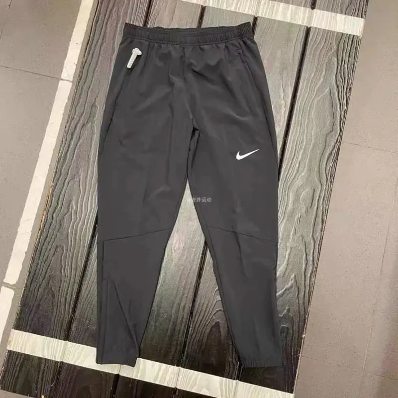 Nike Tracksuits Hooded zip-up tracksuit — Black track pants with white hooks, size 2
