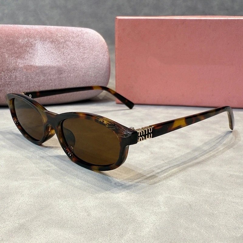 Miu Miu Round Black Oversized Sunglasses