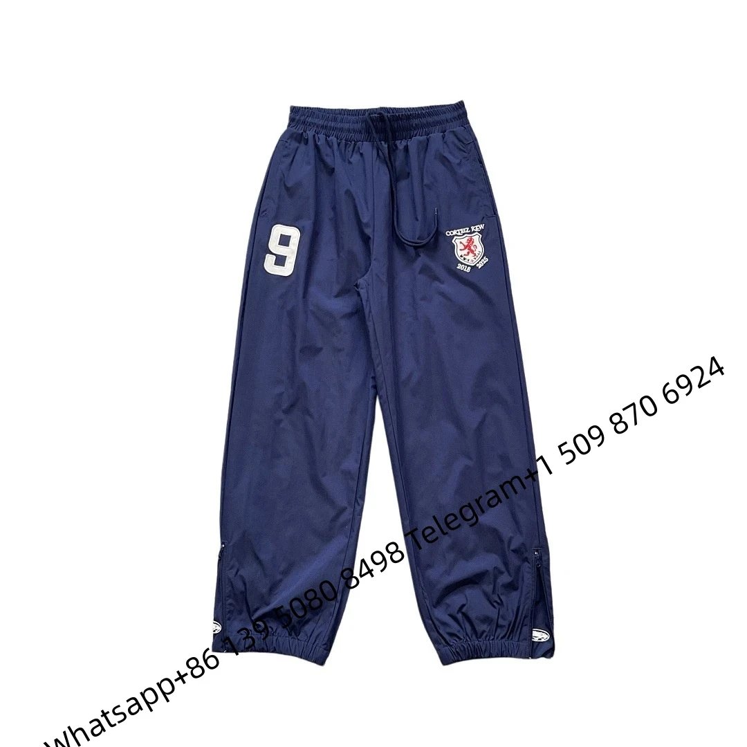Corteiz 9 Logo Windbreaker Pants Navy