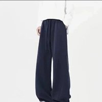 Navy blue {trousers}