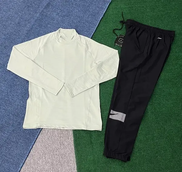 Nike Base Layer Top and Training Pants Set in Off-White and Black Activewear - 1