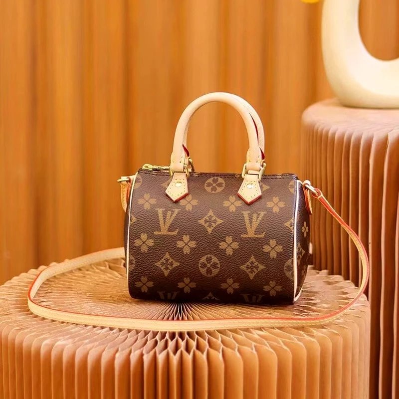 Louis Vuitton Multiple handbag models — Speedy Bandoulière 1