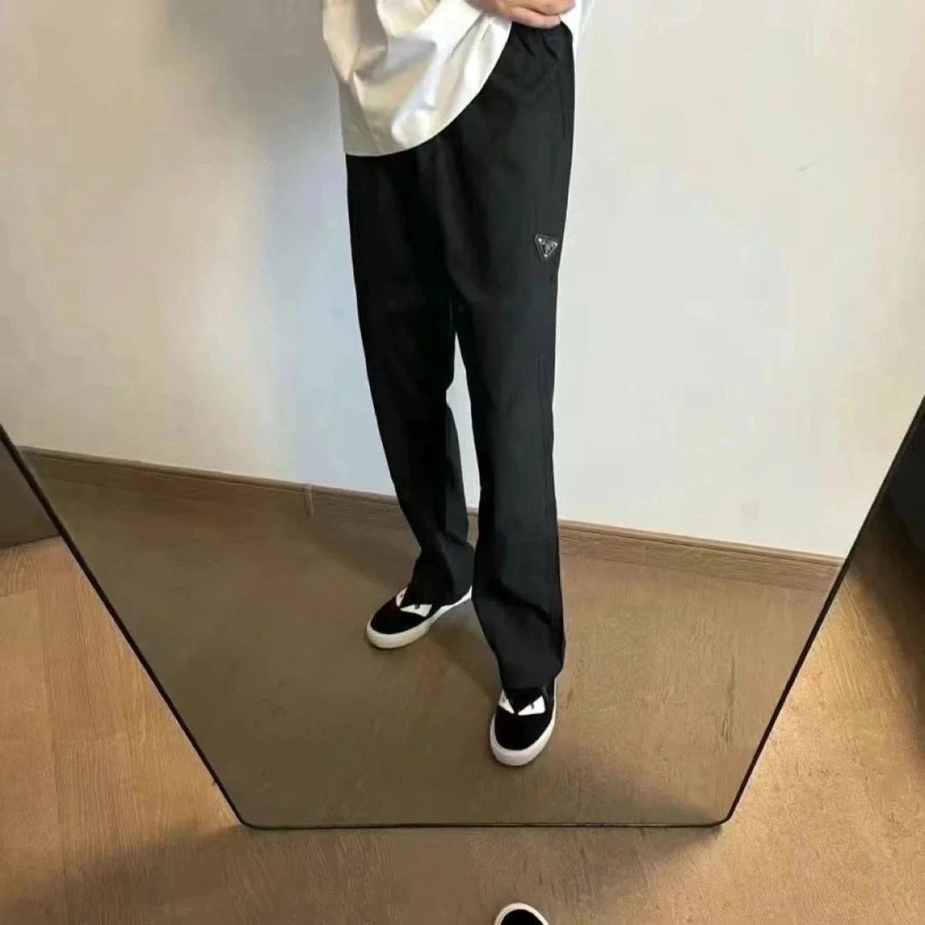 Prada Trousers Elastic-waist drawstring with triangular logo plaque — Black