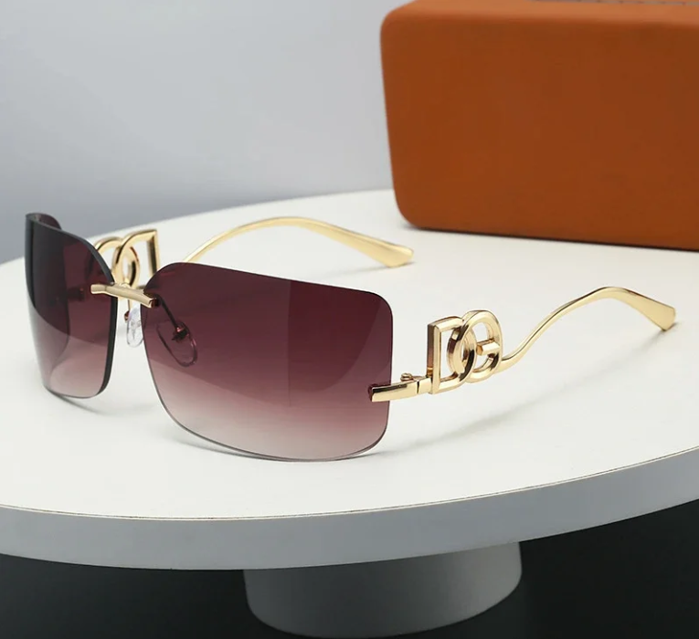 Unbranded Eyewear Rimless rectangular sunglasses with geometric metal temples — gold frame coffee tablets