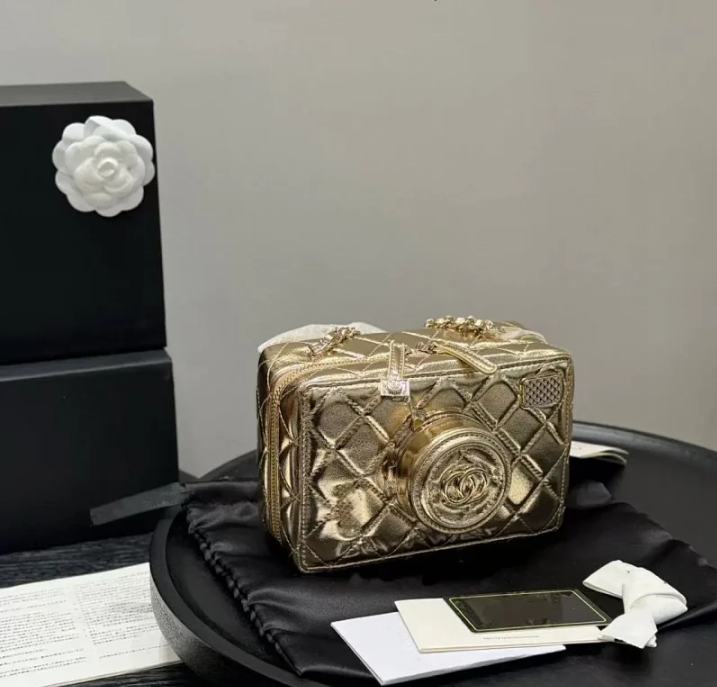 Chanel Crossbody Bags Quilted camera-style mini chain bag — Golden