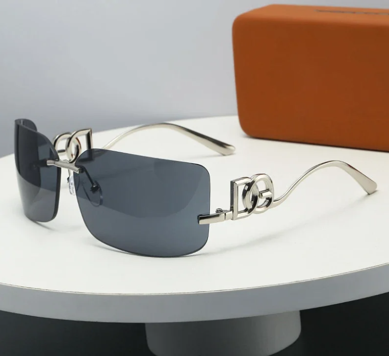 Unbranded Eyewear Rimless rectangular sunglasses with geometric metal temples — Silver frame, gray lenses