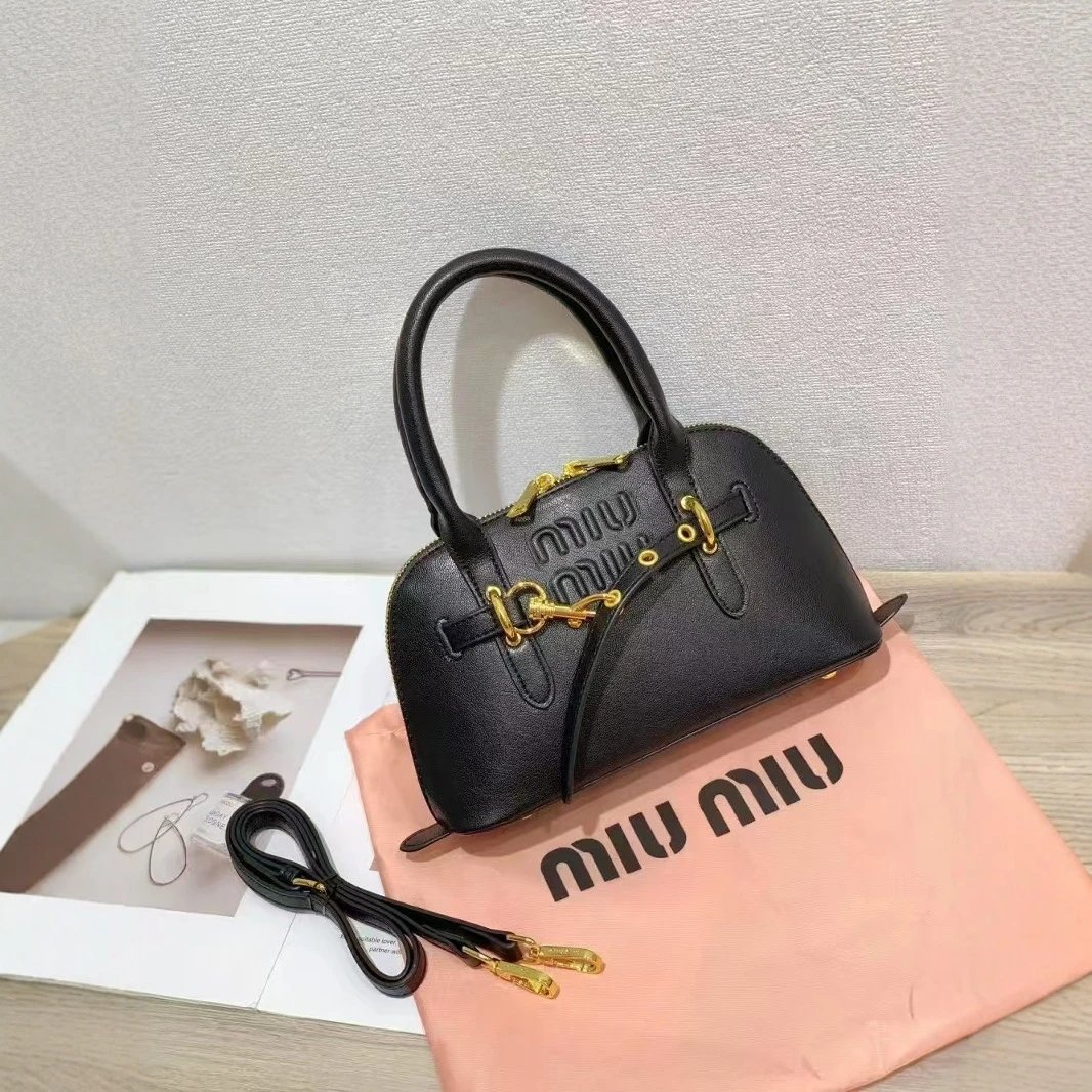 Miu Handbags Dome handbag with belt-style gold-tone hardware and detachable shoulder strap image 2