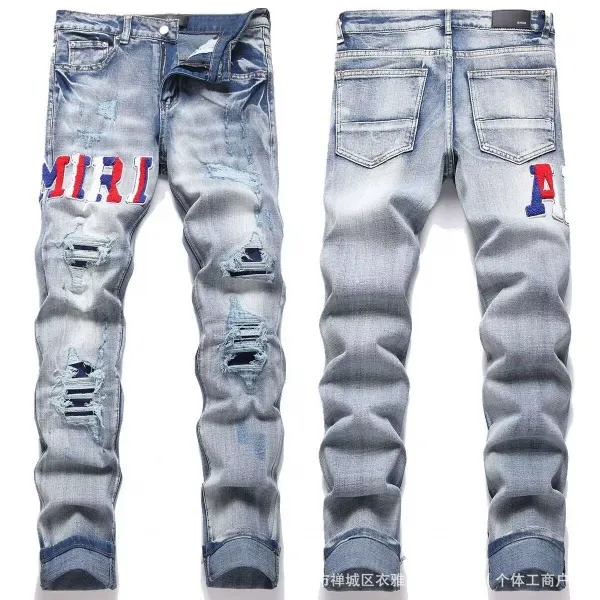 Amiri Distressed Logo Patch Jeans Light Wash - 1
