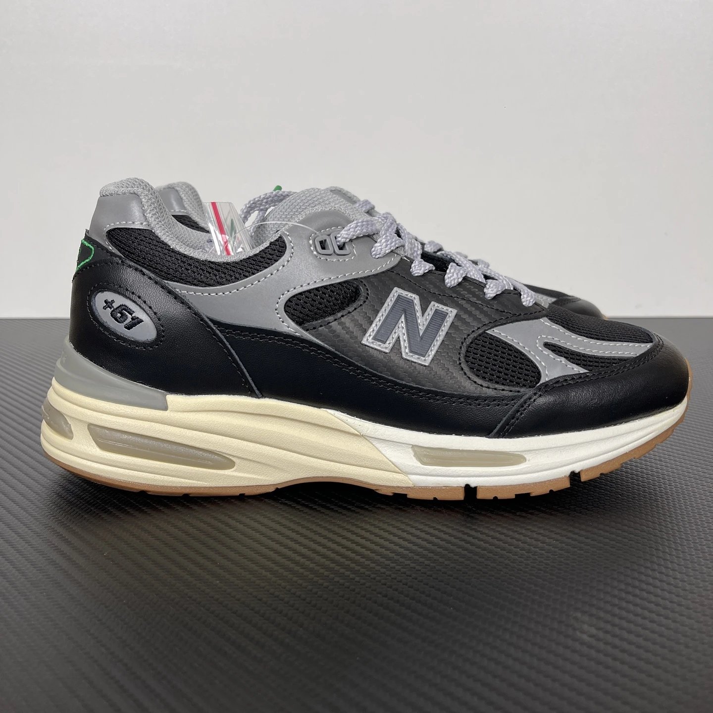 New Balance Multiple models shown — NB991 black-gray U991UT2