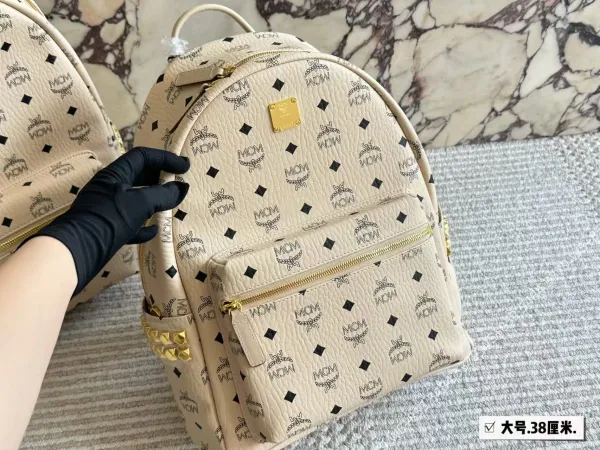 MCM Stark Backpack Beige Monogram Leather Backpack - 1