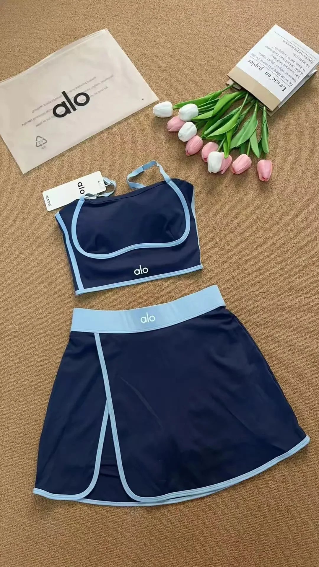 Alo Matching Sets Contrast-Trim Crop Top and Wrap-Style Skirt Set — al blue suit