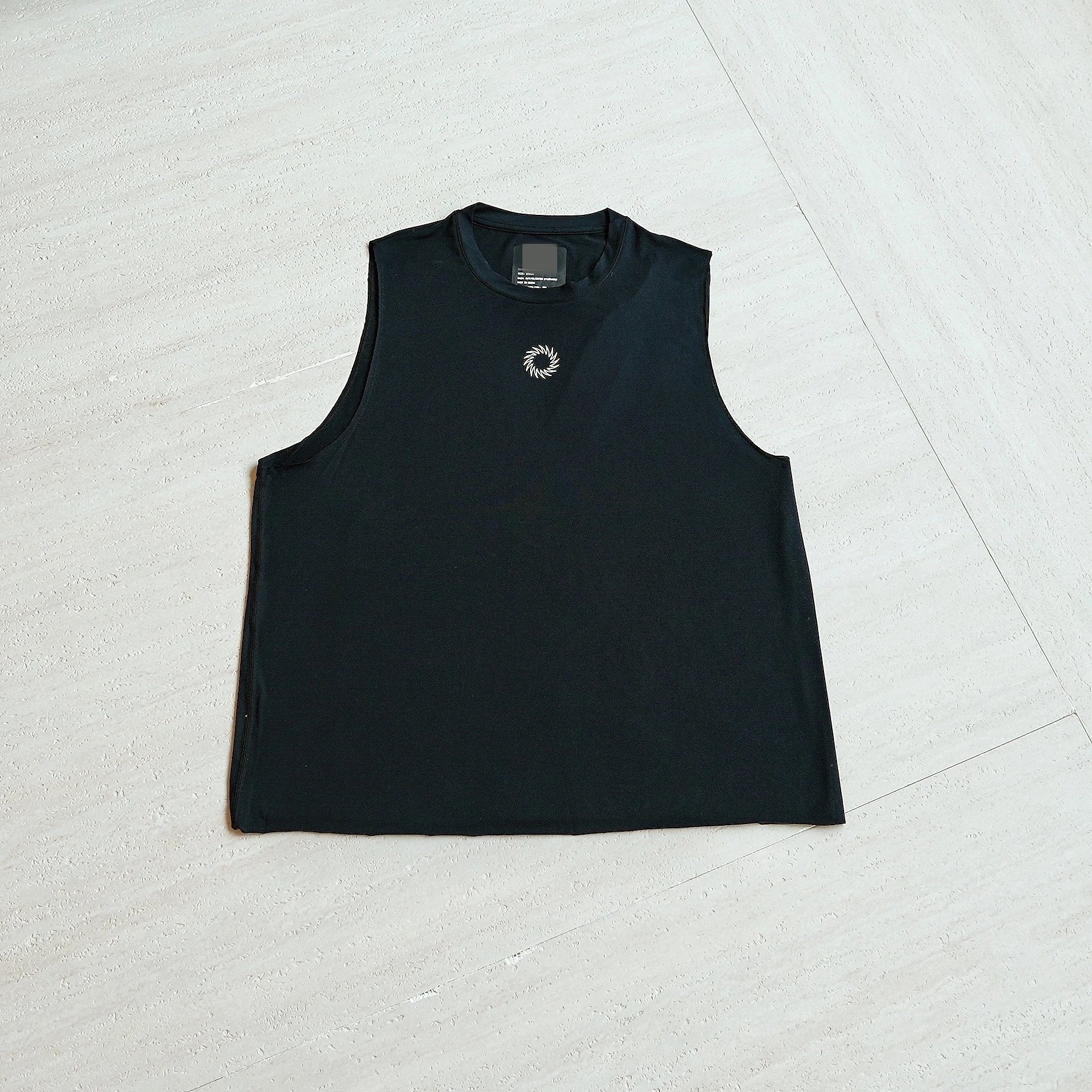 Black Sleeveless Performance Tank Top With Circular Logo