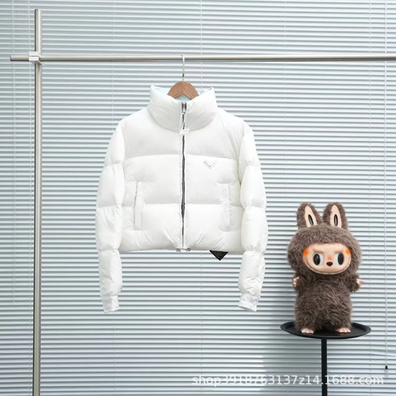 Stüssy Down Jackets Hooded quilted puffer jacket — prada- white