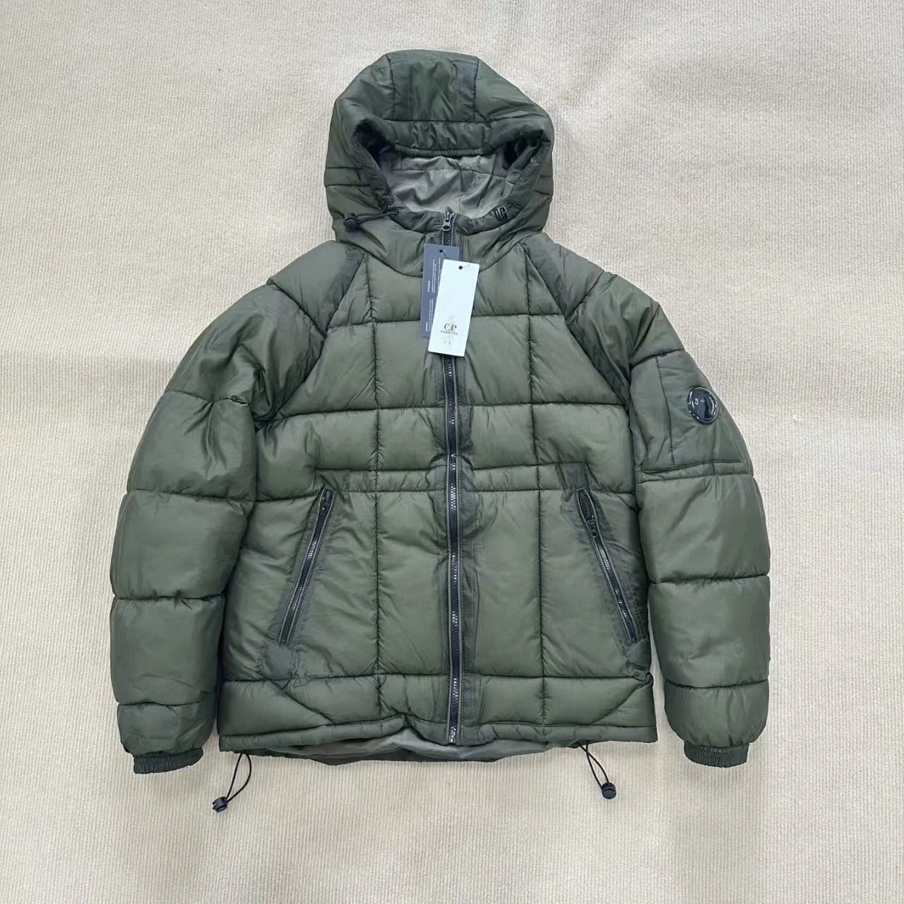 Stüssy Down Jackets Hooded quilted puffer jacket — CP-Army Green