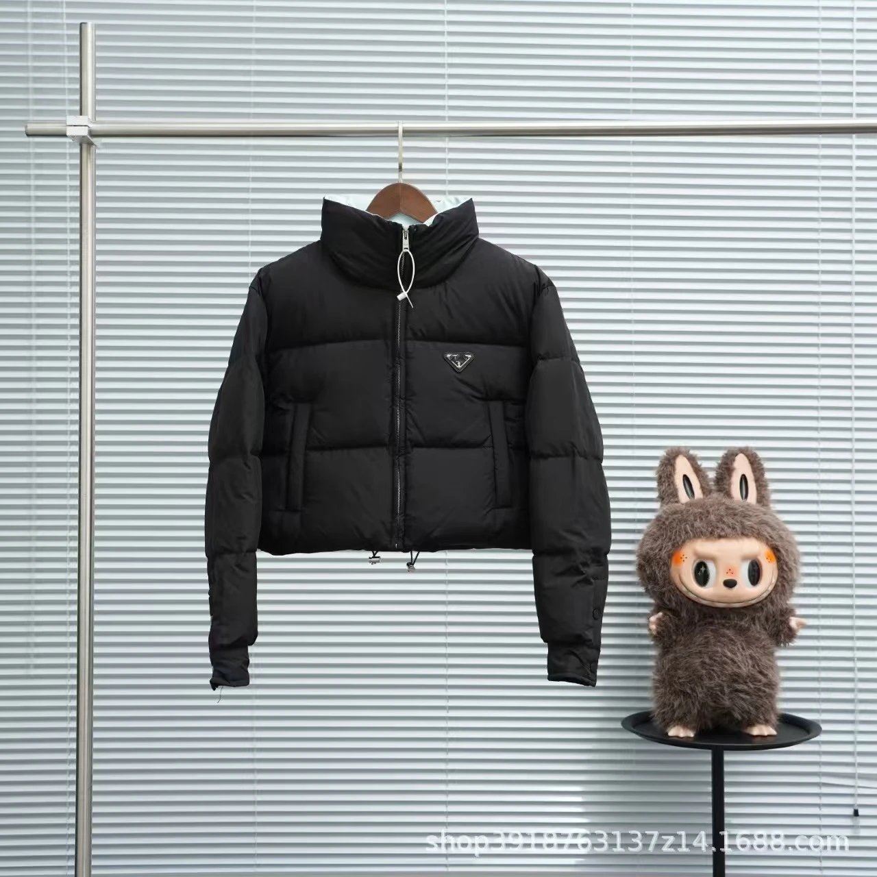 Stüssy Down Jackets Hooded quilted puffer jacket — prada - Black