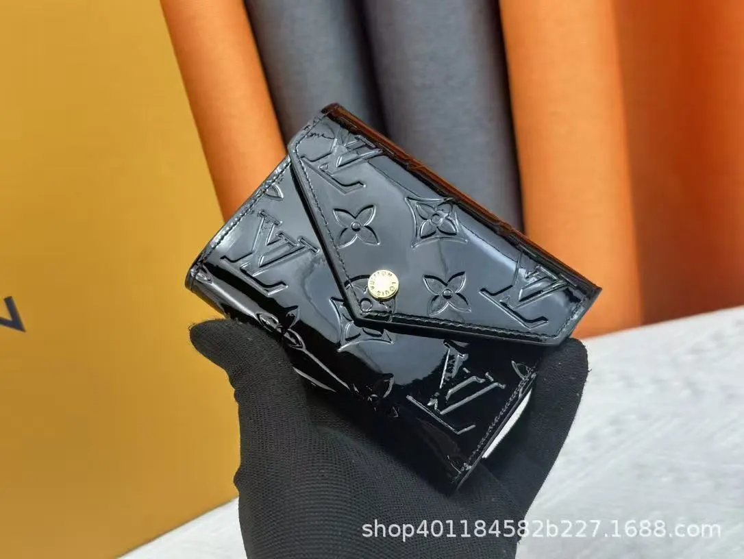 Louis Vuitton Wallets & Card Holders Monogram snap wallet with slots — 32