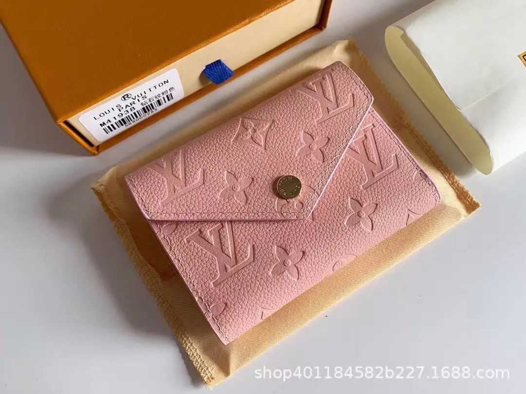 Louis Vuitton Wallets & Card Holders Monogram snap wallet with slots — 24