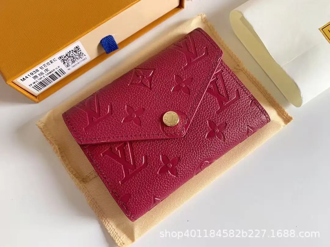 Louis Vuitton Wallets & Card Holders Monogram snap wallet with slots — 23