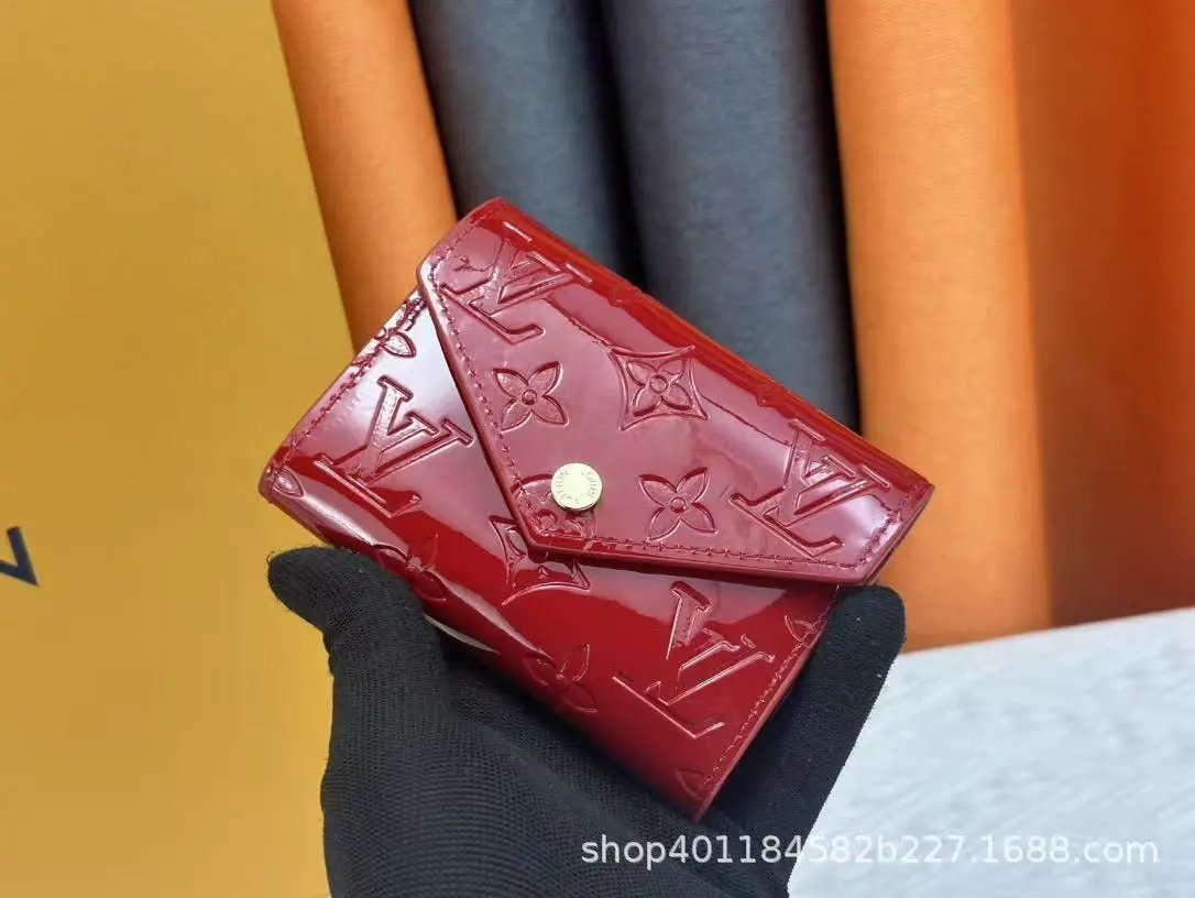 Louis Vuitton Wallets & Card Holders Monogram snap wallet with slots — 28