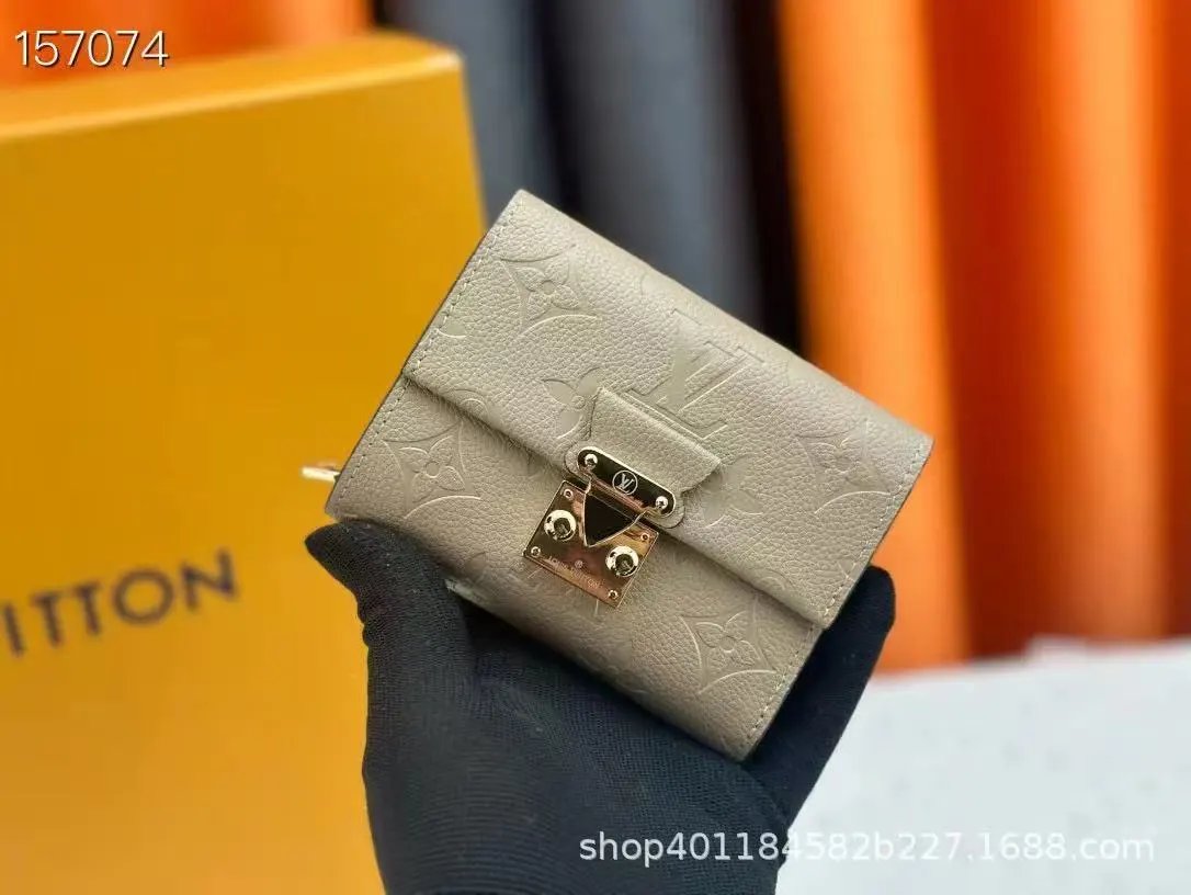 Louis Vuitton Wallets & Card Holders Monogram snap wallet with slots — 38