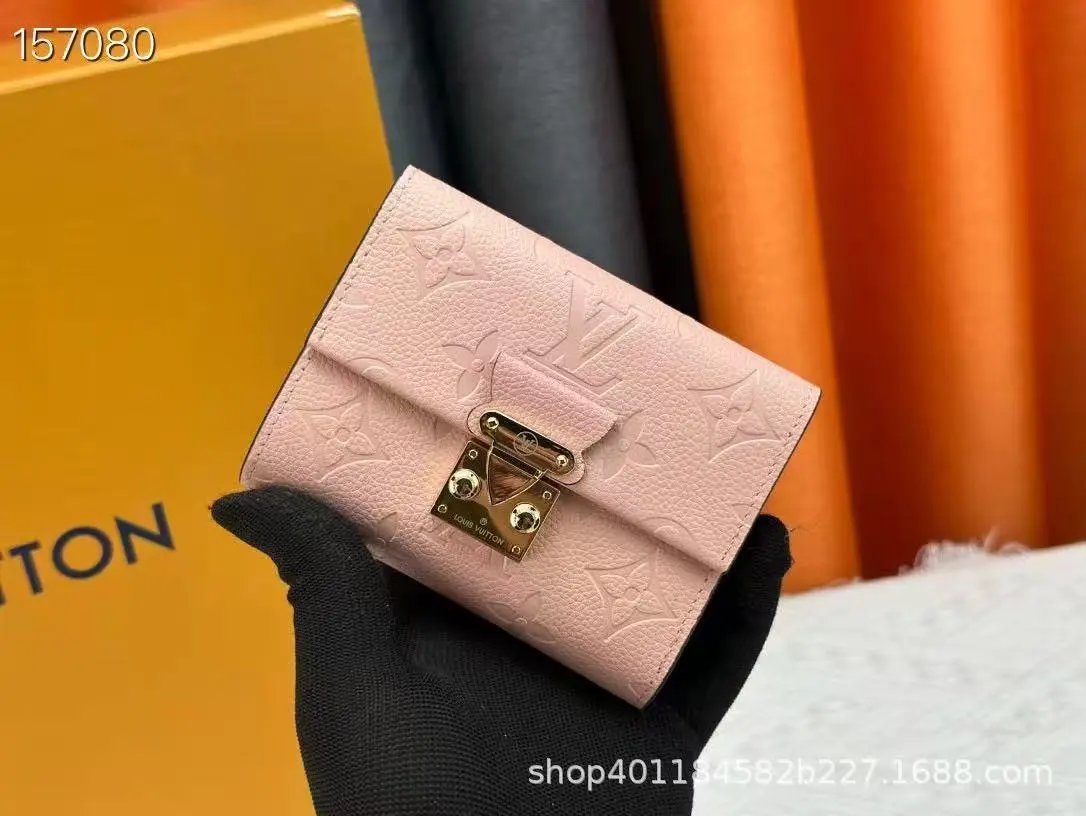 Louis Vuitton Wallets & Card Holders Monogram snap wallet with slots — 36