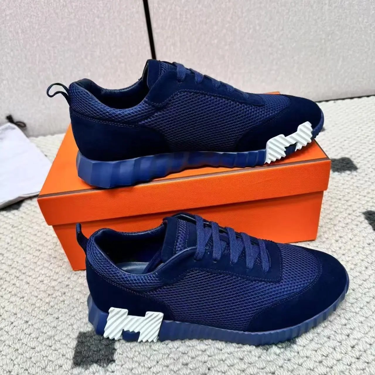 Hermès Sneakers Suede and mesh lace-up with lug soles — 24