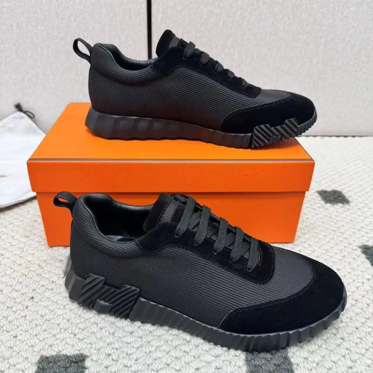 Hermès Sneakers Suede and mesh lace-up with lug soles — 28