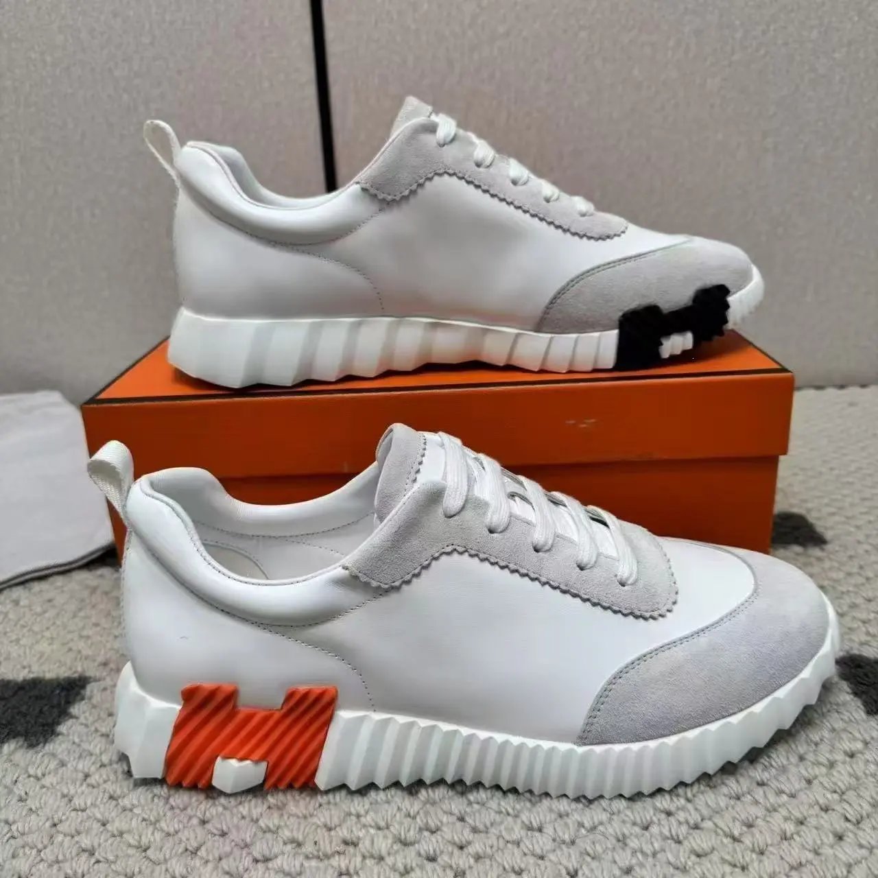 Hermès Sneakers Suede and mesh lace-up with lug soles — 22