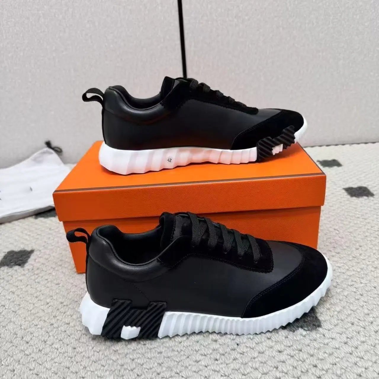 Hermès Sneakers Suede and mesh lace-up with lug soles — 32