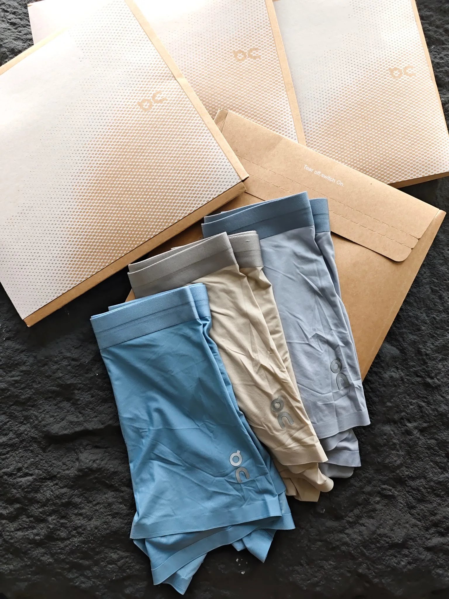 On Running Boxer Briefs in Blue, Beige, and Gray Underwear - 8