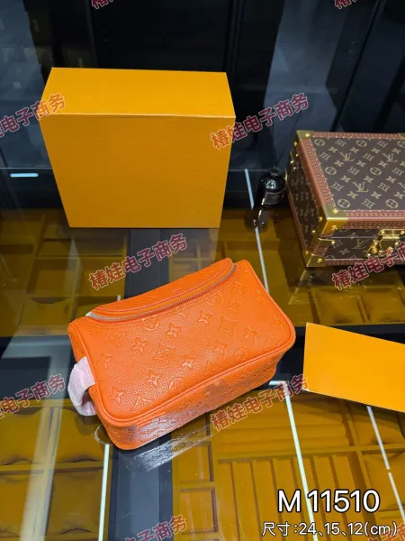 Louis Vuitton Monogram Empreinte Orange Toiletry Pouch Clutches - 1