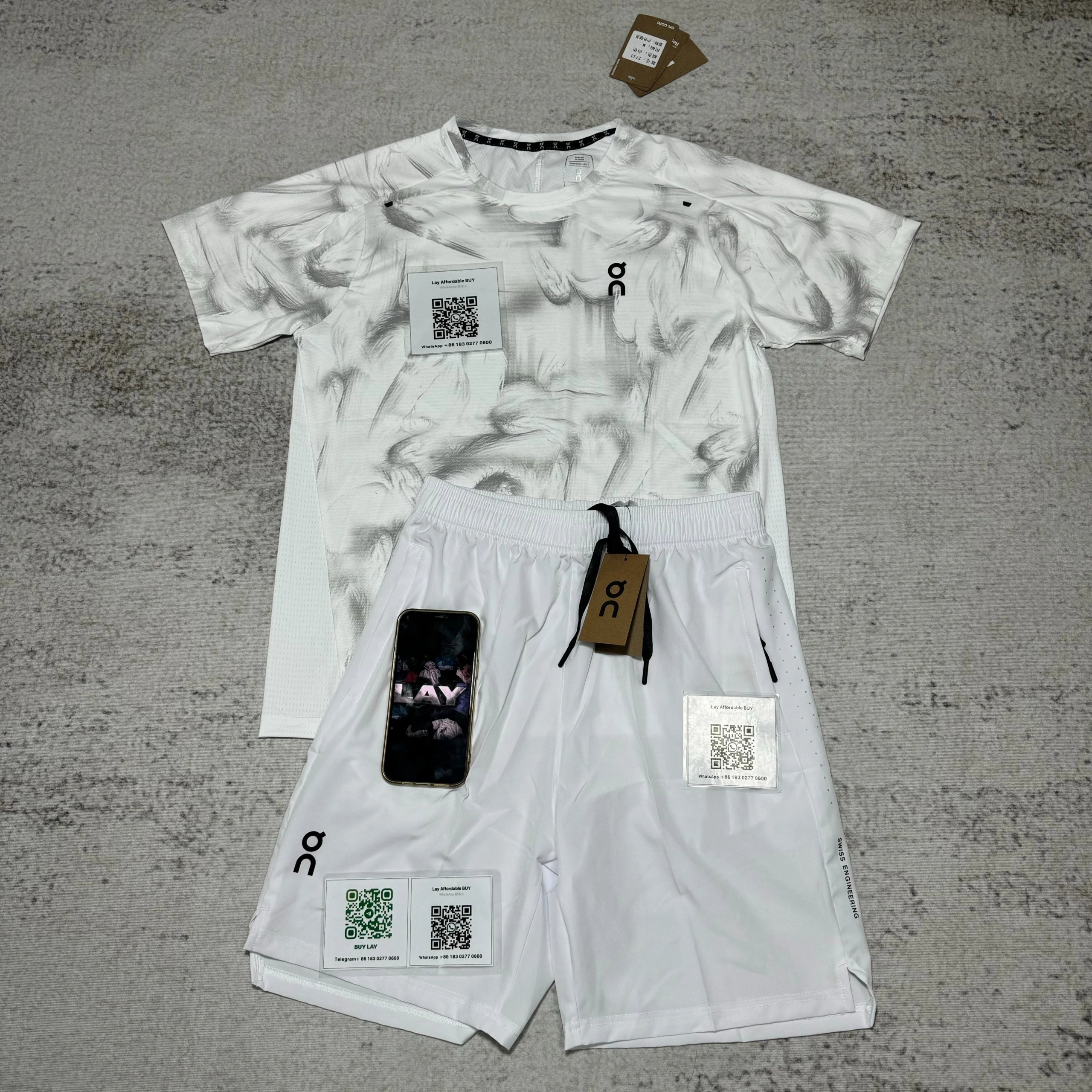 On Matching Sets Marble-print short-sleeve T-shirt and shorts set — White suit