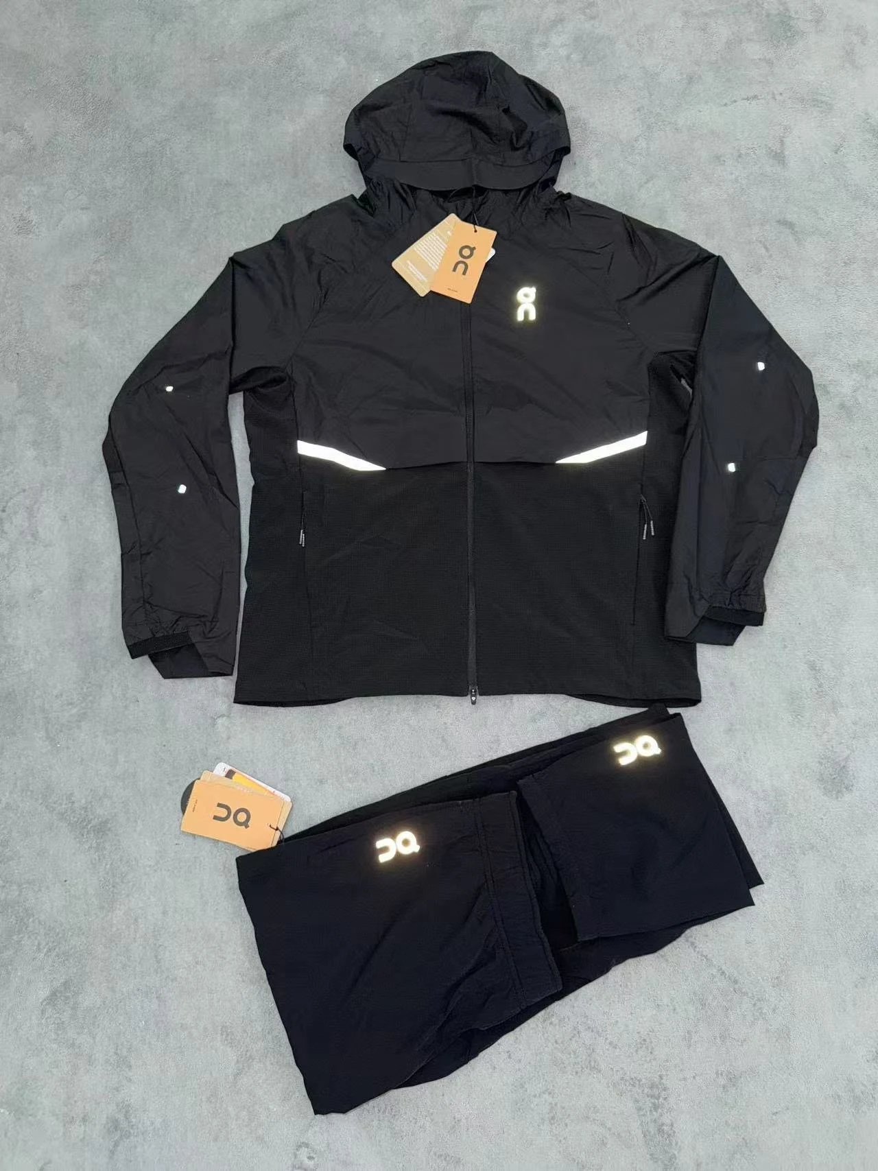 On Tracksuits Hooded reflective color-block running set image 1