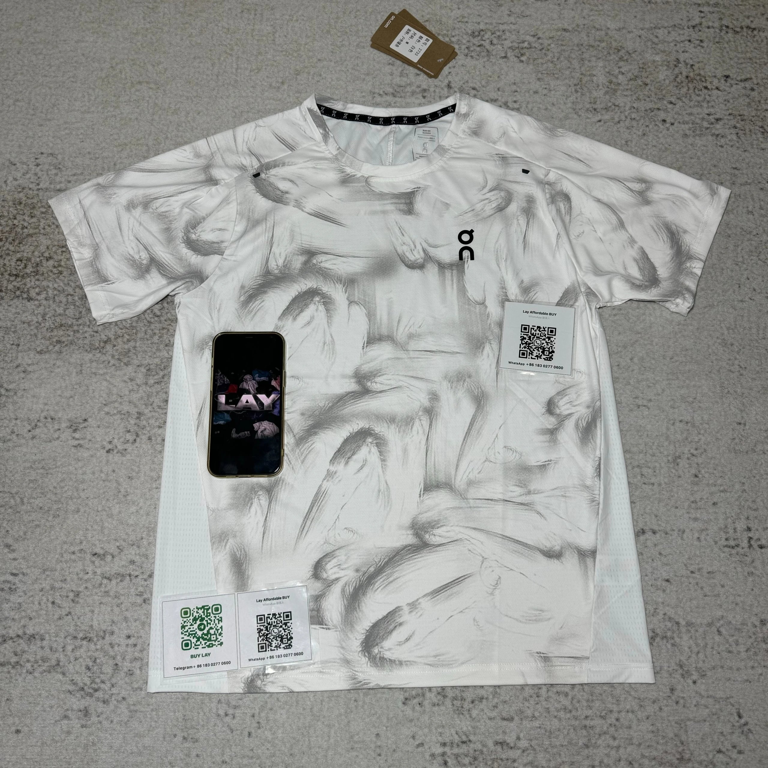 On Matching Sets Marble-print short-sleeve T-shirt and shorts set — White top