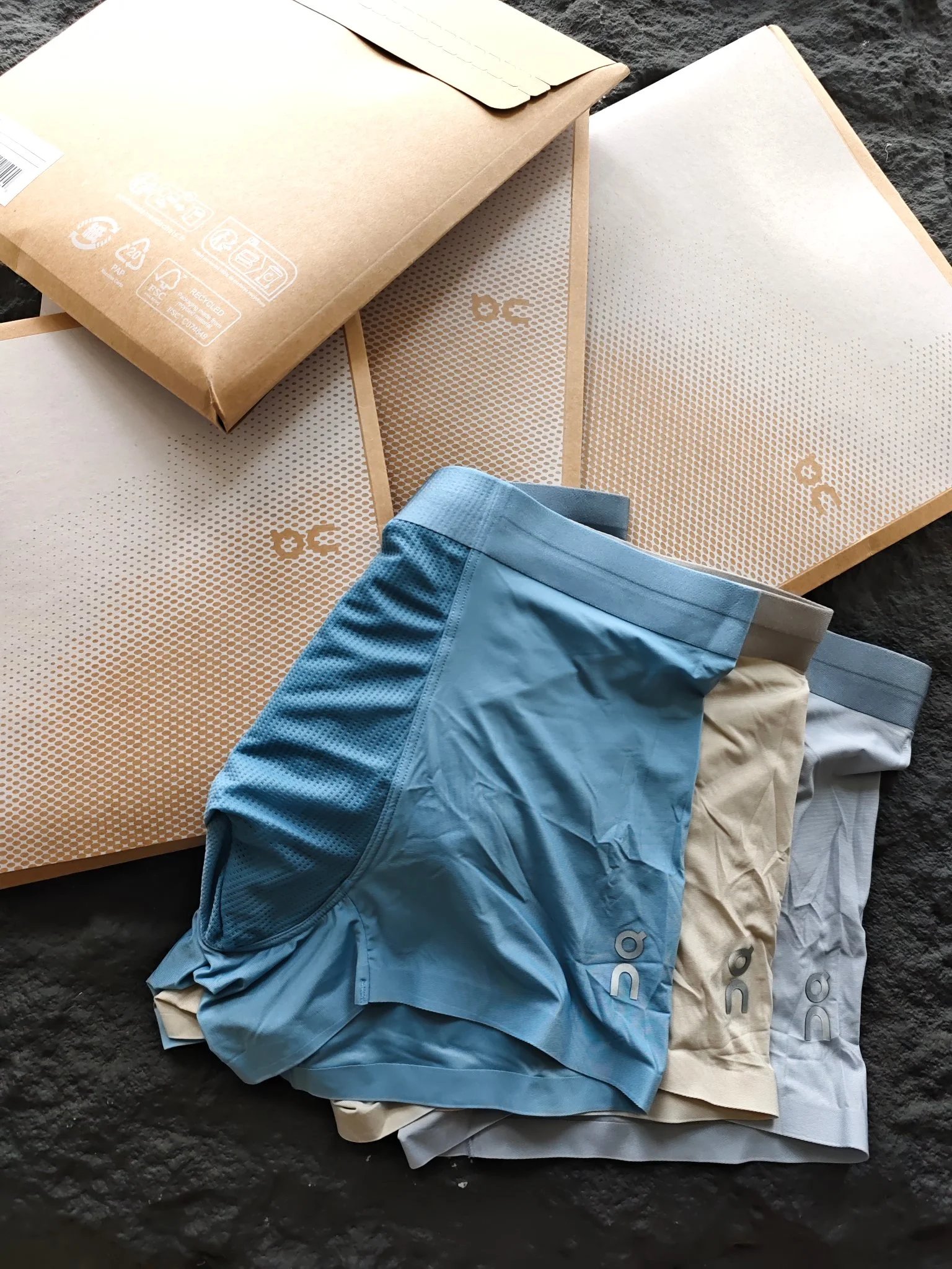 On Running Boxer Briefs in Blue, Beige, and Gray Underwear - 4