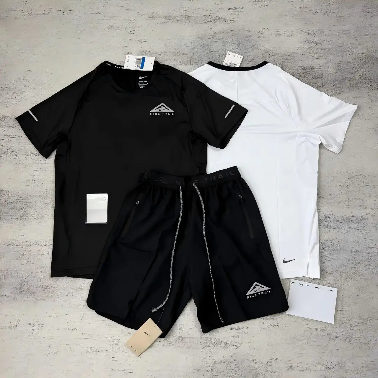 Nike Matching Sets Trail short-sleeve T-shirt and zip-pocket shorts set image 6