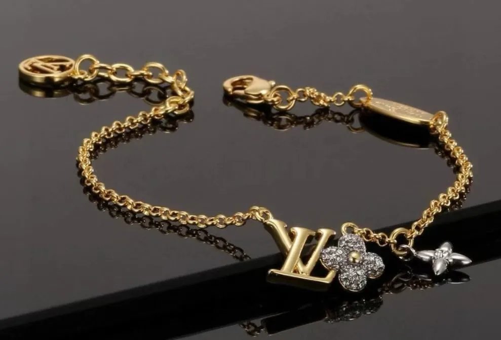 Louis Vuitton Jewelry Monogram Charm Bracelet — 21