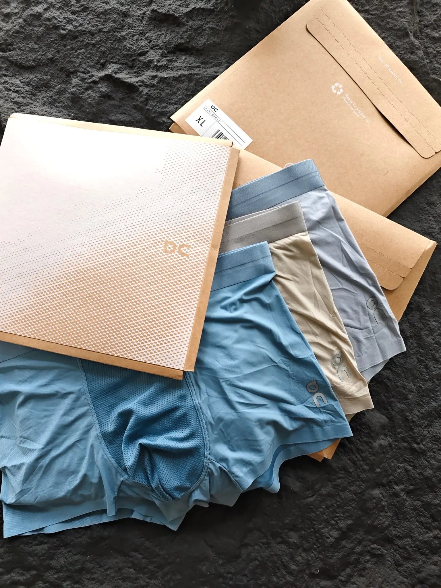 On Running Boxer Briefs in Blue, Beige, and Gray Underwear - 3